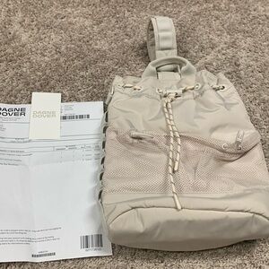 DAGNE DOVER | Nova Sling Bag in moonbeam.